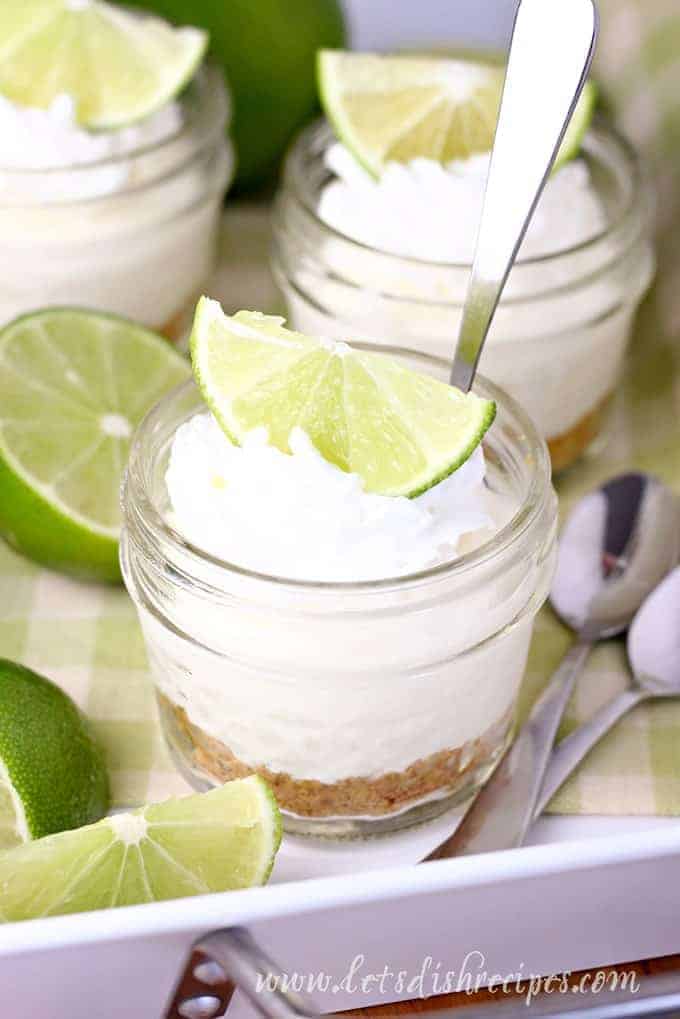 Mini key lime cheesecake in a small mason jar.