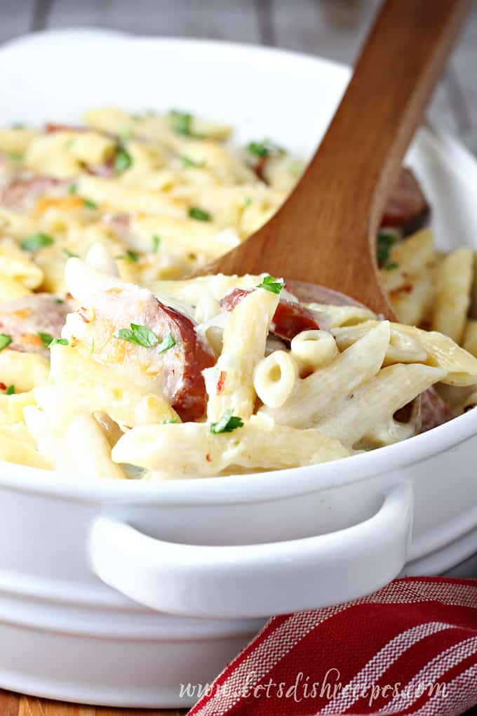 Baked penne pasta in Alfredo sauce with smoked sausage.