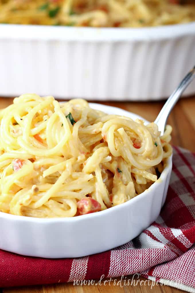 Cheesy chicken spaghetti made with Rotel tomatoes and green chilies.